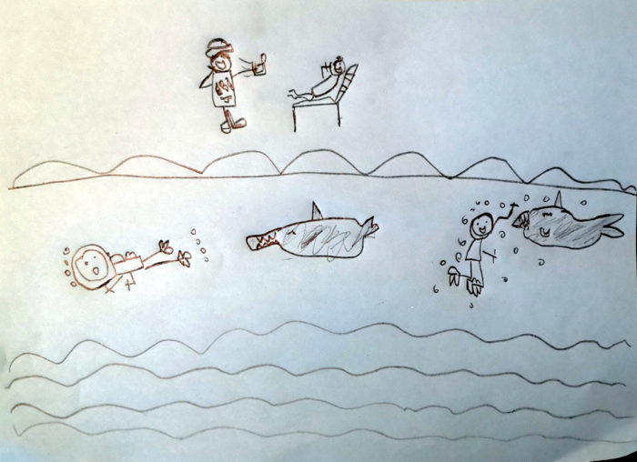 Beach, divers and the fish